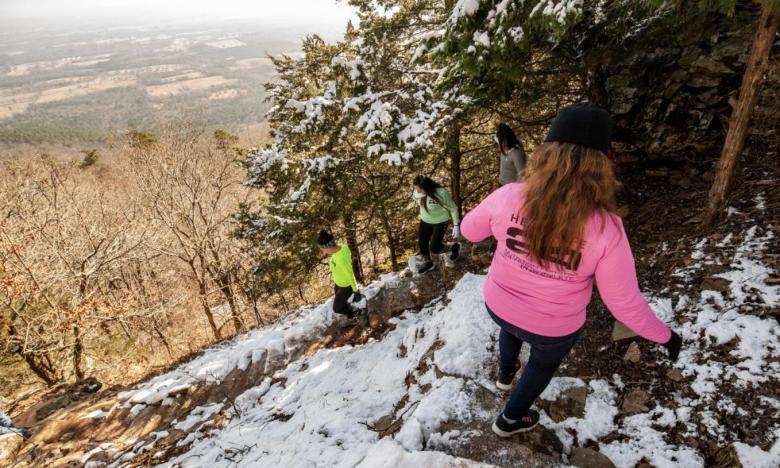 Hiking the Rim Trail at Mount Nebo State Park.